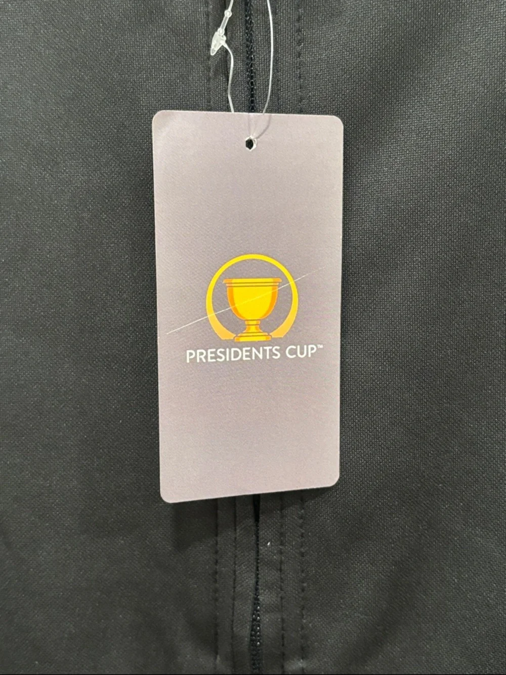 PGA TOUR Black Presidents Cup Sleeveless Zip Vest with Yellow Logo